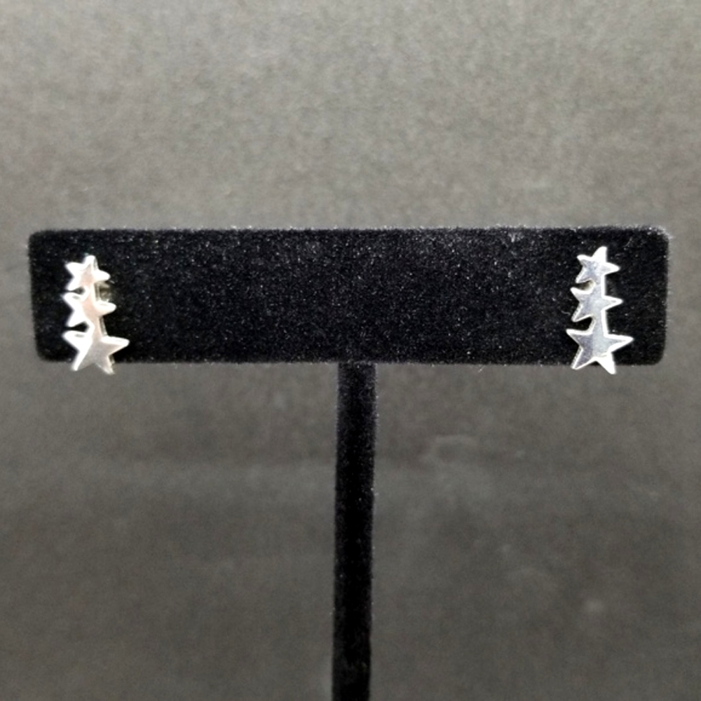 Silver cascading star earrings ⭐